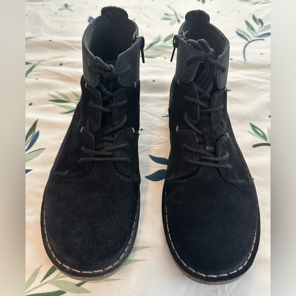 Clarks sued boots